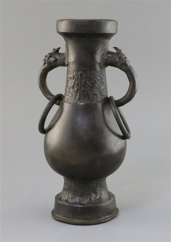 A Chinese bronze temple vase, Song-Yuan dynasty (12th-14th century), H. 29.5cm